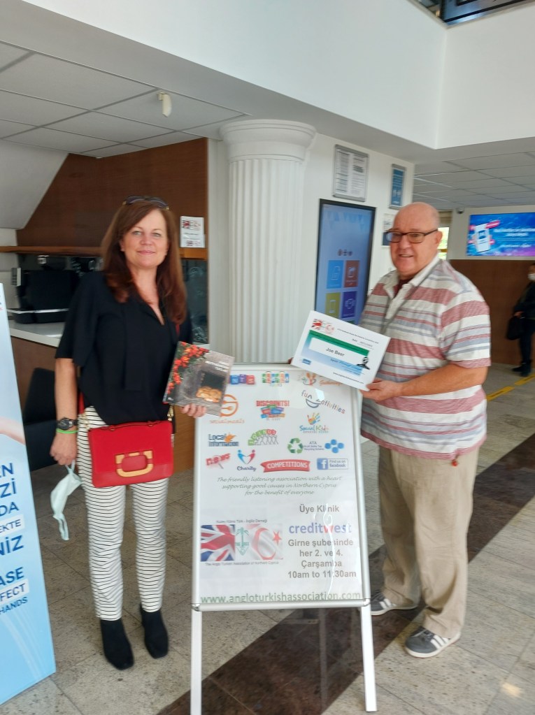 NOVEMBER 2021 Monthly prize winner (person with the most correct guesses during the month) is: - Joe Beer seen here receiving her prize and certificate from the association chairman