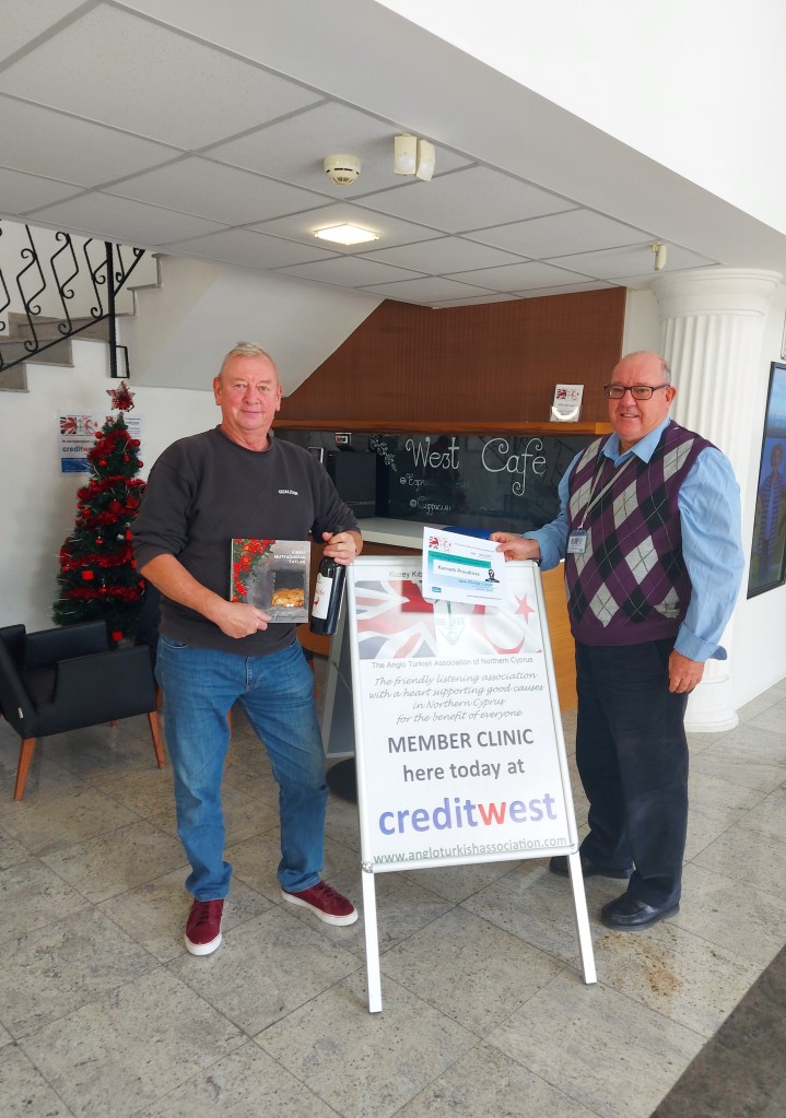 DECEMBER 2021 Monthly prize winner (person with the most correct guesses during the month) is: - Ken Proudlove seen here receiving his prize and certificate from the association chairman