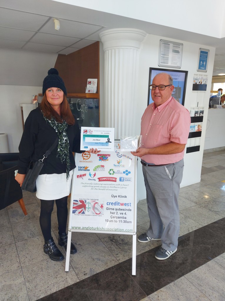 DECEMBER 2021 Festive Season prize winner is (person with the most correct guesses during the 2021 festive season) is: - Joe Beer seen here receiving her prize and certificate from the association chairman