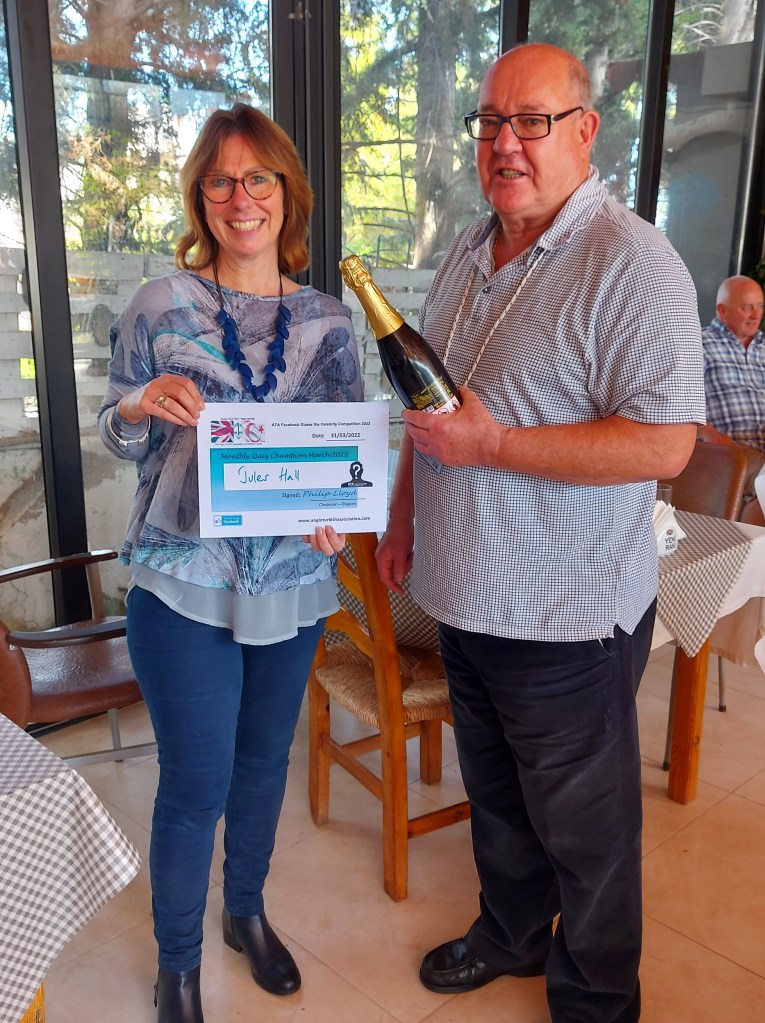 MARCH 2022 Monthly prize winner (person with the most correct guesses during the month) is: - Jules Hall  seen here receiving her prize and certificate from the association chairman
