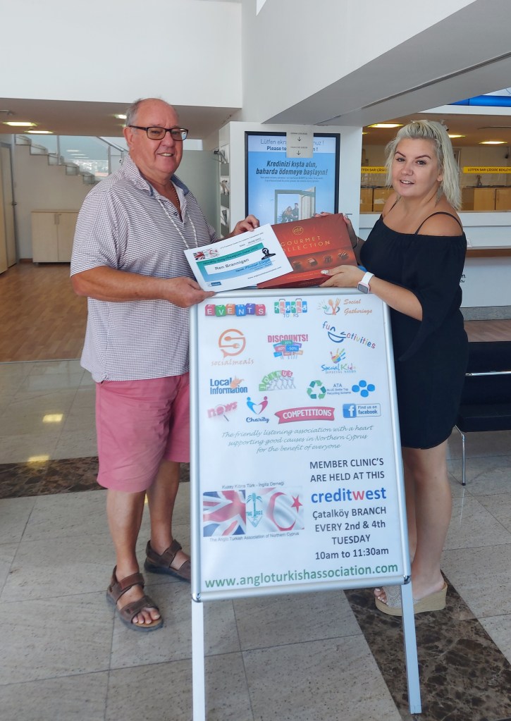 JUNE 2022 Monthly prize winner (person with the most correct guesses during the month) is: - Ren Brannigan seen here receiving her prize and certificate from the association chairman