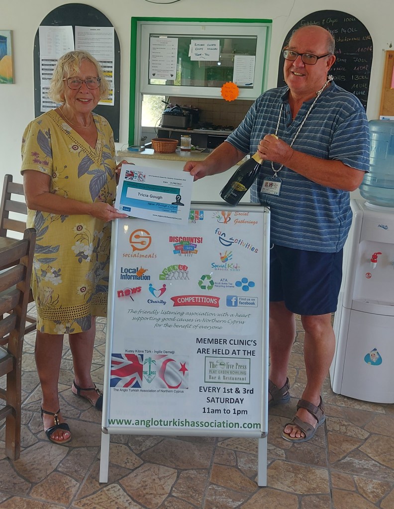 AUGUST 2022 Monthly prize winner (person with the most correct guesses during the month) is: - Tricia Gough seen here receiving her prize and certificate from the association chairman