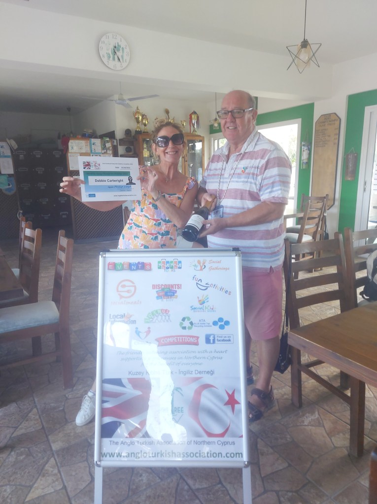 OCTOBER 2022 Monthly prize winner (person with the most correct guesses during the month) is: - Debbie Cartwright seen here receiving her prize and certificate from the association chairman